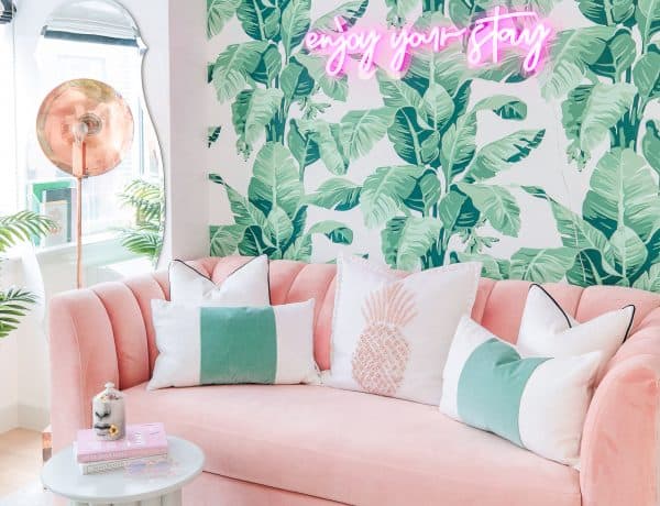 lindsay silberman blogger home office palm wallpaper neon sign pink couch