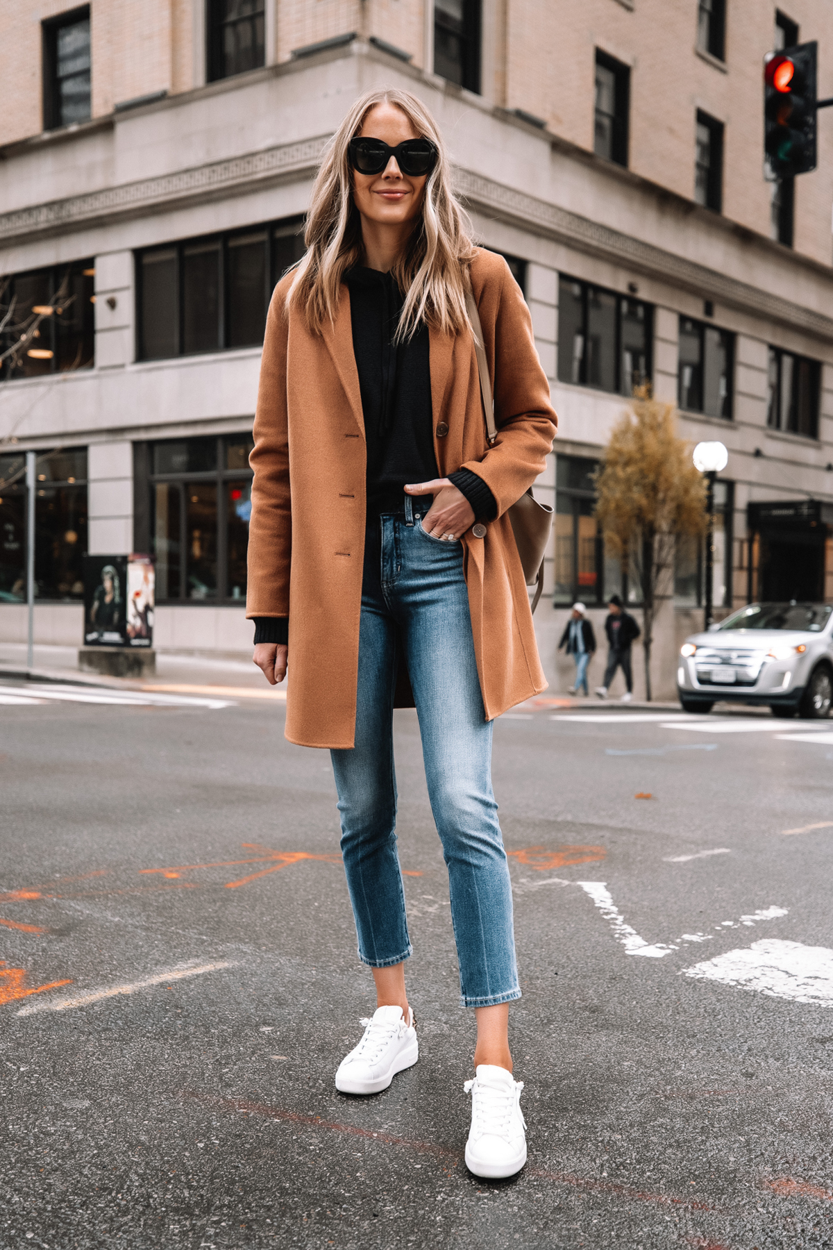blue jeans with camel coat outfit