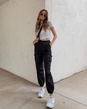cargo-style jeans and a crop top