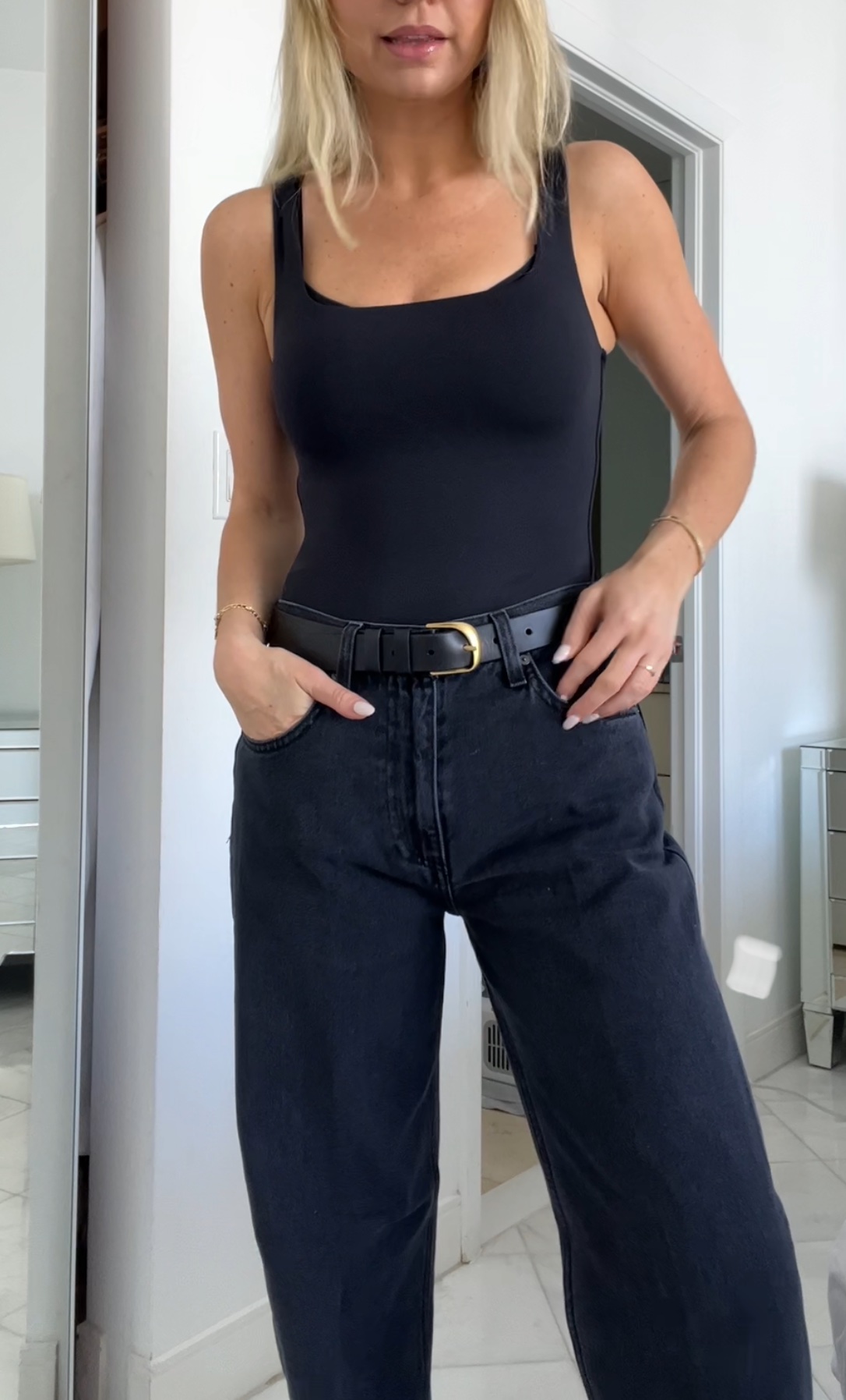black tank and black jeans outfit