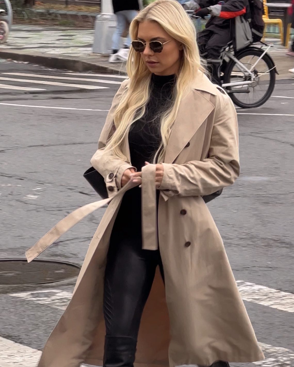 rainy day outfit with a trench coat and leather leggings