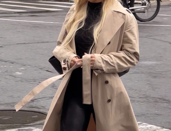 rainy day outfit with a trench coat and leather leggings