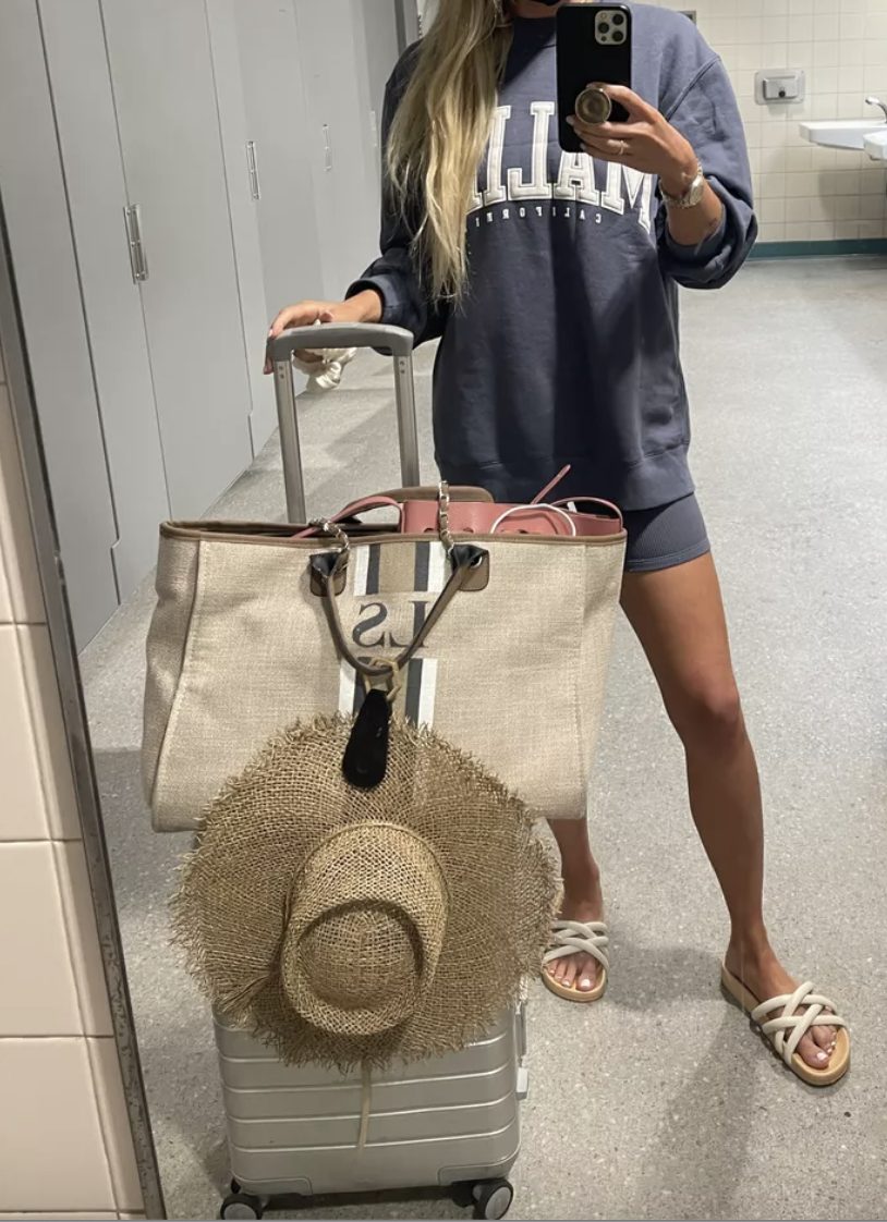 bike short outfit with a sweatshirt and sandals