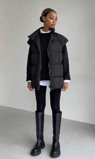 rain boot outfit with leggings and a puffer vest