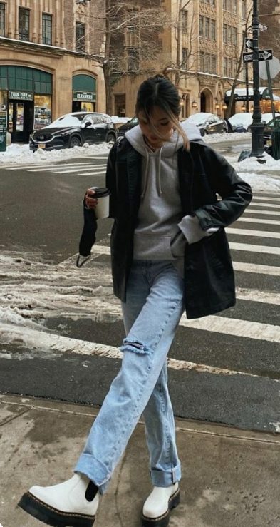 rainy day outfit - jeans, hoodie, rain coat, and rain boots