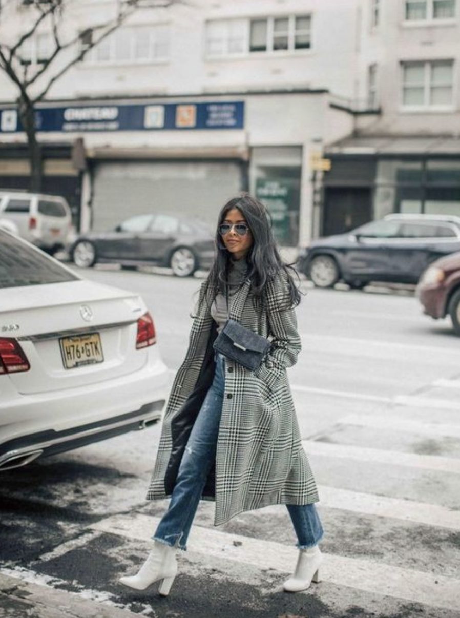 white boots with jeans and a plaid trench coat